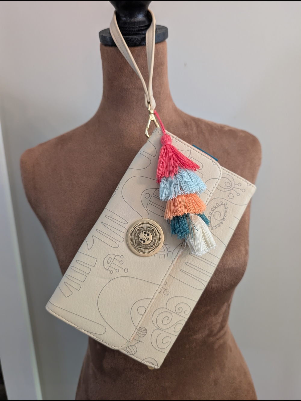 Jungalow Cream Wristlet with Multicolor Tassel Charm
